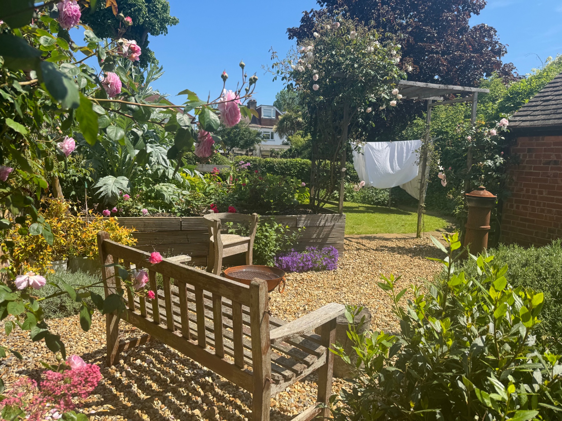 A well-maintained garden by Orange Pod Gardening